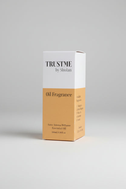 Box of 'Trust Me by Shulan' 100ml oil fragrance on a gray background