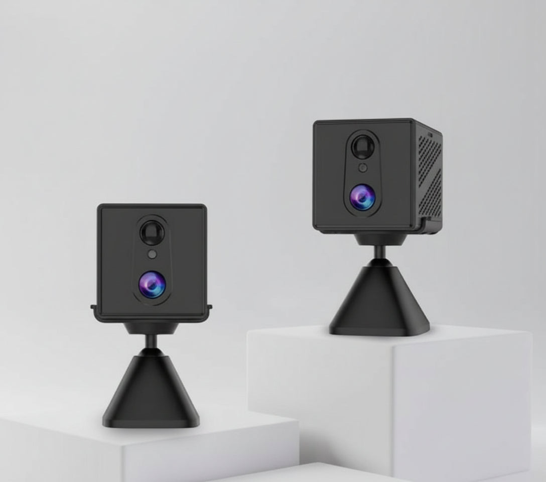 Two black CB70W security cameras on stands against a white background