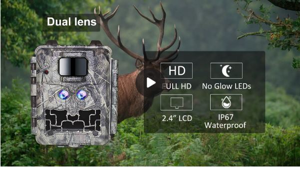 Trail KW591 camera with dual lenses and various features displayed in front of a deer in a forest setting.