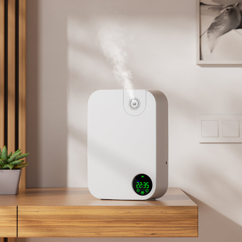 White humidifier diffuser K30 with digital display on a wooden surface, emitting steam.