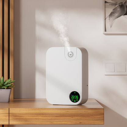 White humidifier diffuser K30 with digital display on a wooden surface, emitting steam.