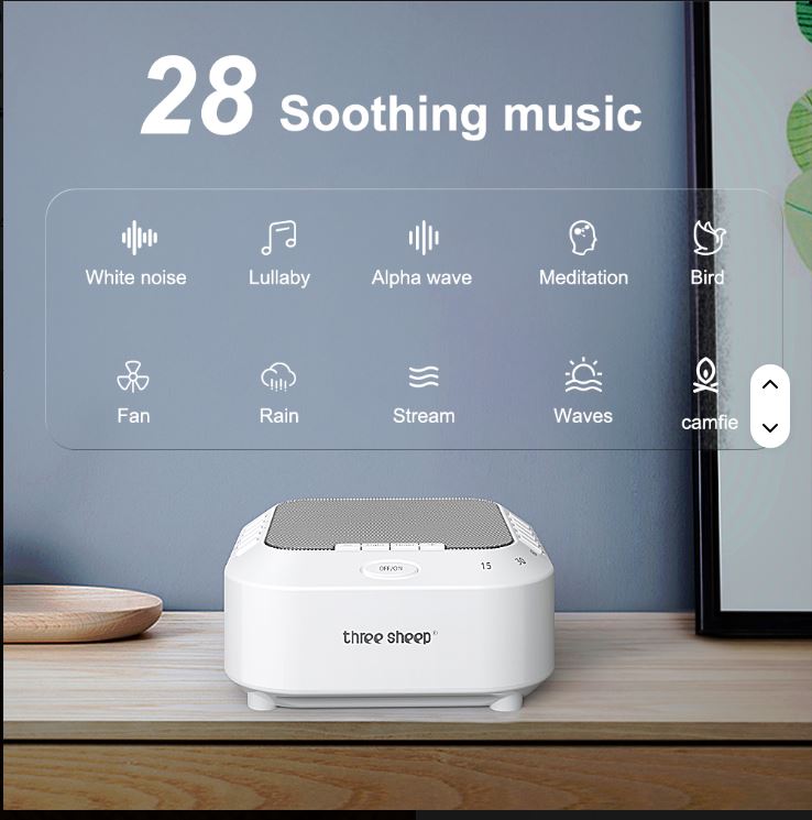White noise machine with sound selection options on a wooden surface