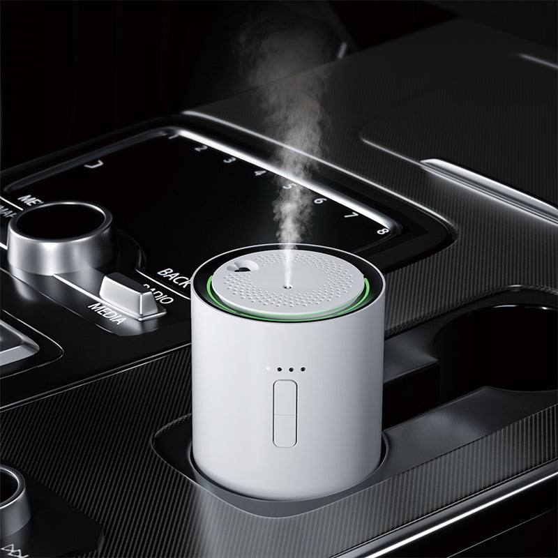 white j03 Car air freshener with steam emitting from it, placed in a car's cup holder.