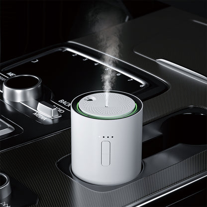 white j03 Car air freshener with steam emitting from it, placed in a car's cup holder.